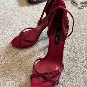 Read White House black market, high heels with red gemstones